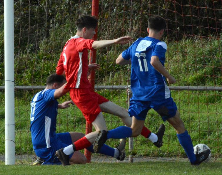 GOAL - Tomas Gwilliam applies the scoring touch for Merlins Bridge against Milford United at Marble Hall